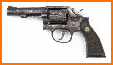 S&W 10-6 Revolver, .38 Special, 4 Heavy Barrel, Fixed Sights, Blued7659