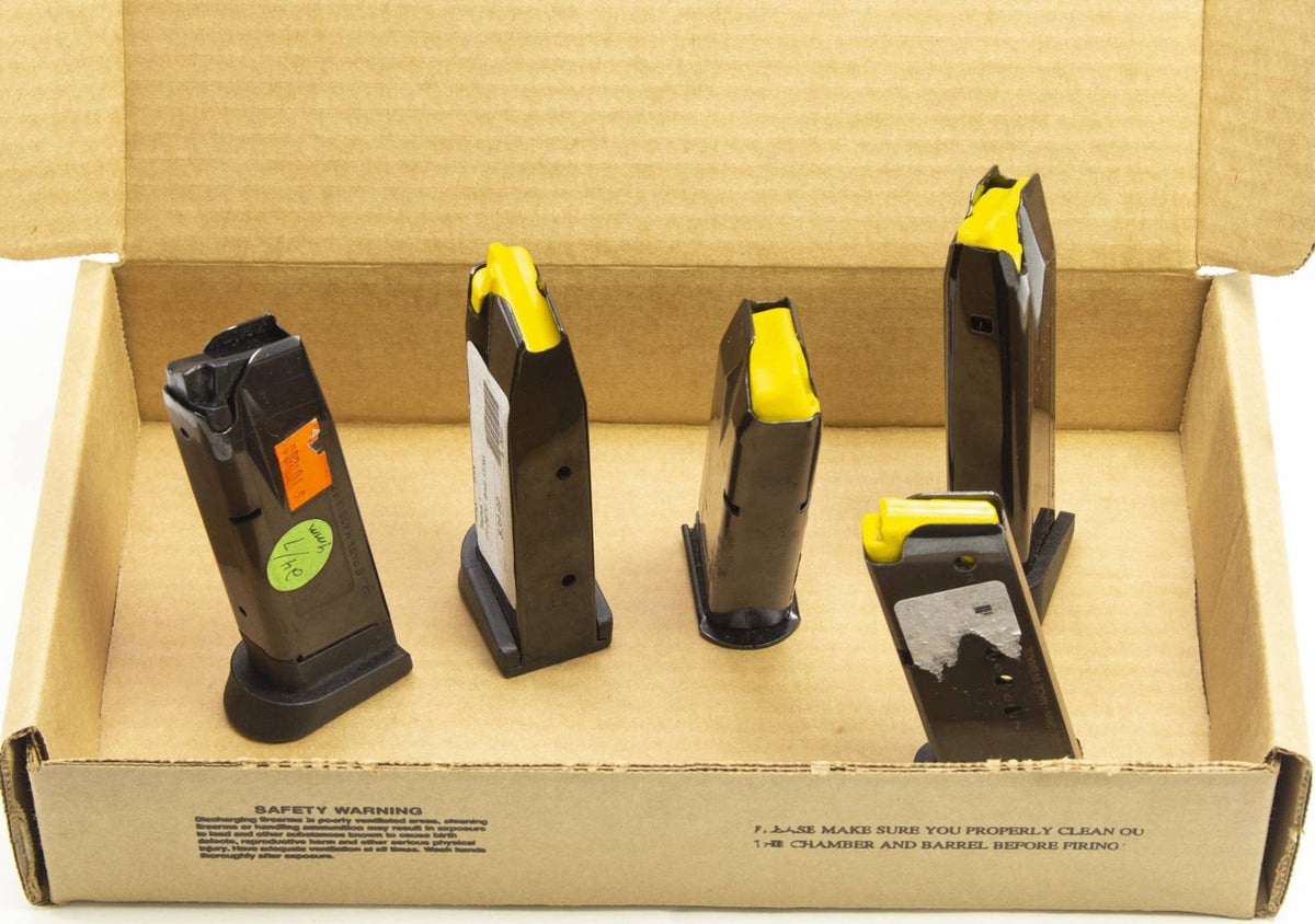 5 USED TAURUS 9MM MAGS